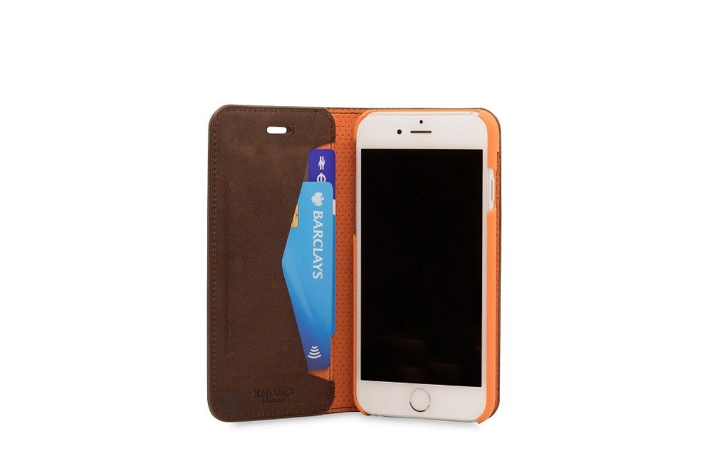 https://dpyxfisjd0mft.cloudfront.net/lab9-2/Producten/Knomo/knomo-leatherfolio-7-brown-2.jpg?1484146614&w=1000&h=660